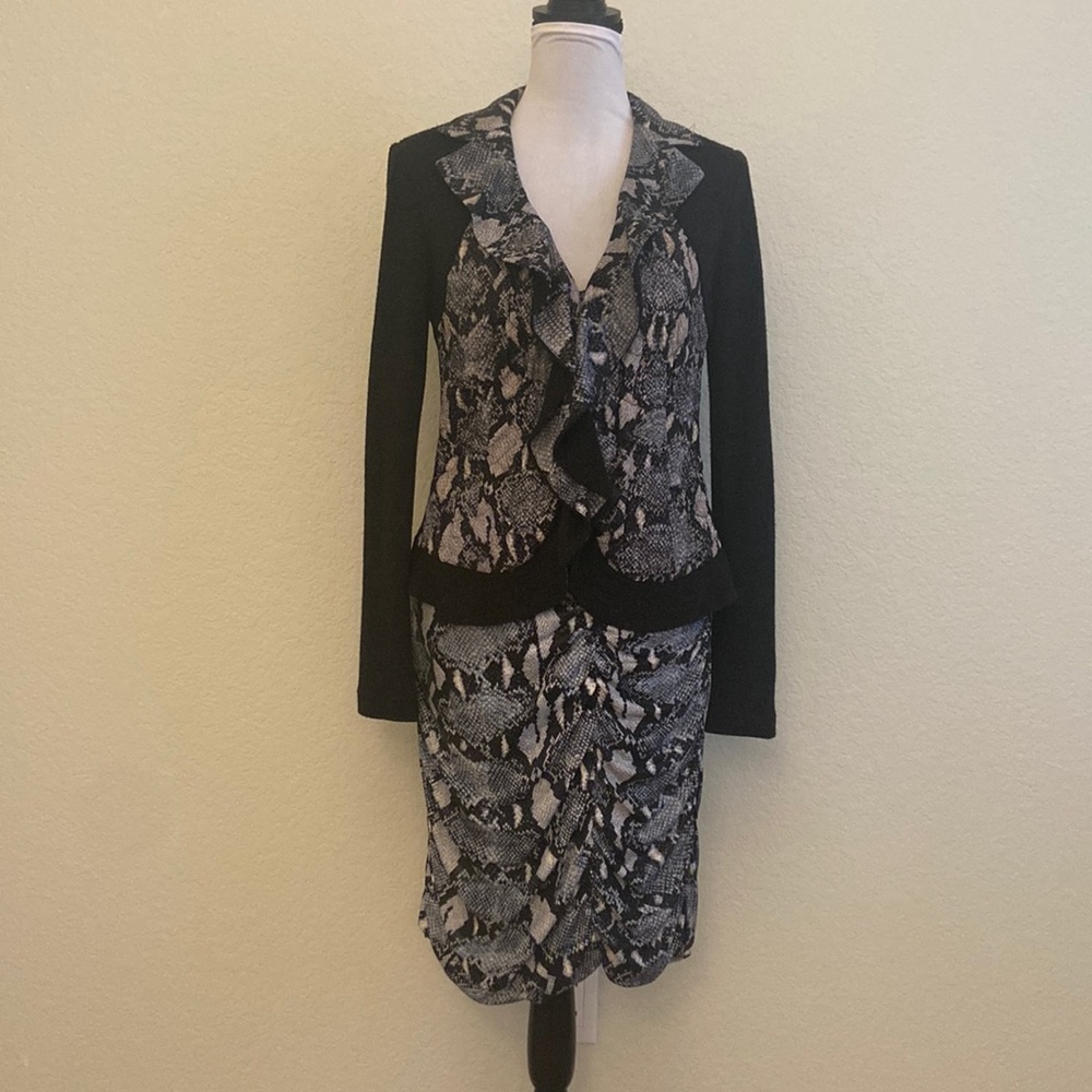 Two-piece skirt suit by Alberto Makali